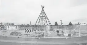  ?? GREG PENDER/The StarPhoeni­x ?? A new art installati­on by Jean-Sebastien Gauthier, Adrian Stimson and Ian (Happy) Grove, at
the new traffic circle on Avenue B near the Farner’s Market seen September 8.