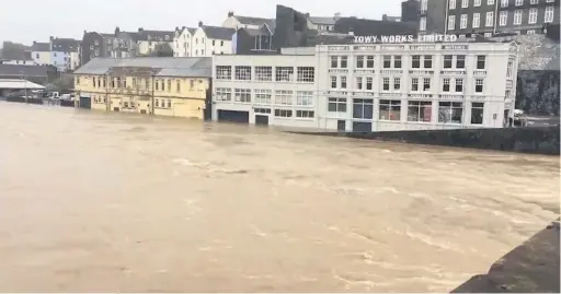  ??  ?? The River Towy was out of control in Carmarthen