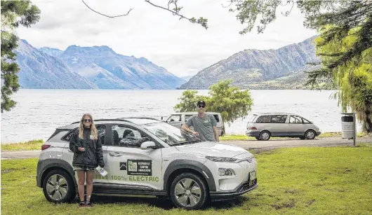  ?? PHOTO: SUPPLIED ?? On patrol . . . Queenstown Lakes freedom camping ambassador­s Sophie Johnston and Neco Wieringa check a lakeside reserve near Kingston yesterday.
