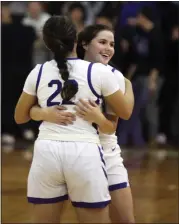  ?? RANDY MEYERS — FOR THE MORNING JOURNAL ?? Keystone players celebrate a win over Columbia and a third straight LC8Champio­nship on Feb. 2.