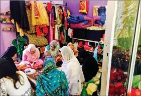  ??  ?? Women workers at “Tehzeeb Creations” in Deoband don’t have a “uniform opinion” on the controvers­y around tripe talaq.