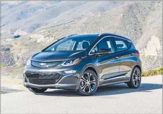  ?? JESSICA LYNN WALKER / GM VIA AP ?? The 2019 Chevrolet Bolt is an electric car that gets 238 miles of range on a charge.