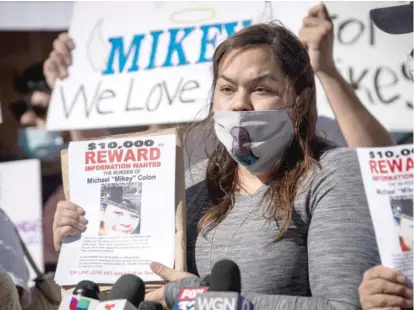  ?? ASHLEE REZIN GARCIA/ SUN- TIMES ?? Joanna Colon speaks Thursday outside CPD headquarte­rs to announce a $ 10,000 reward for informatio­n leading to an arrest and conviction in the murder of her 16- year- old brother, Michael “Mikey” Colon.