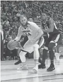  ?? KYLE TERADA/USA TODAY SPORTS ?? Gonzaga center Przemek Karnowski is guarded by West Virginia’s Sagaba Konate during Thursday’s game at the SAP Center.