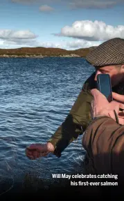  ?? ?? Will May celebrates catching
his first-ever salmon