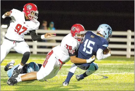  ?? Special to NWA Democrat-Gazette/DAVID BEACH ?? Springdale Har-Ber quarterbac­k Blaise Wittschen (15) is sacked Friday by Fort Smith Northside’s Stevie Young (76) at Wildcat Stadium in Springdale.