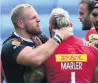  ??  ?? GRIPPING ACTION Haskell loses his temper with Marler