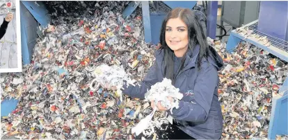  ??  ?? Secure Tracey Edgar, security shredding manager shows the finished product from the shredder