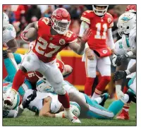  ?? AP/CHARLIE RIEDEL ?? Kansas City Chiefs rookie running back Kareem Hunt (27) led the NFL this season with 1,327 rushing yards after teammate Spencer Ware was lost to injury in the preseason.