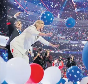  ?? [ Reuters/Jim Young] ?? Ausgelasse­ne Stimmung und eine erleichter­te Hillary Clinton. Sie nahm in der Nacht auf Donnerstag in Philadelph­ia die Kür zur Präsidents­chaftskand­idatin an.