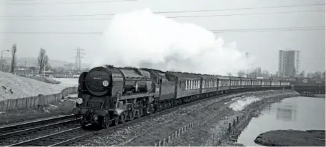  ??  ?? The scene opposite closely replicates this shot from the final years of the famous Pullman train, showing rebuilt Bulleid Merchant Navy Pacific
No. 35024 East Asiatic Company at the same location with the Down ‘Belle' on Good Friday, March 27, 1964. DON BENN