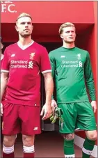  ??  ?? ULTAH KE-125: Jordan Henderson (kiri) dan Lorius Karius mengenakan jersey home Liverpool musim 2017–2018 dengan logo baru. ANFIELD-ONLINE