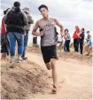  ?? ROBERTO E. ROSALES/JOURNAL ?? Volcano Vista’s Jericho Cleveland won the boys race at the Academy Meet on Friday by nearly 33 seconds.