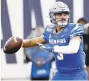  ?? MARK HUMPHREY/AP ?? Quarterbac­k Brady White directs a Memphis offense that ranks 10th nationally in total yards per game. White recently became the winningest quarterbac­k in program history.