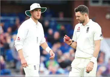  ?? LINDSEY PARNABY/AFP ?? England’s James Anderson (right) and Stuart Broad (left) will be key as England look to bounce back from their first Test defeat against Australia.
