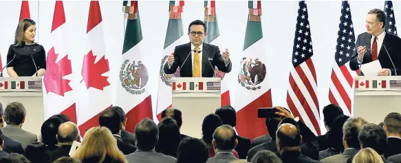  ?? AP ?? Canadian Foreign Affairs Minister Chrystia Freeland (left) Mexico’s Secretary of Economy Ildefonso Guajardo Villarreal (center) and US Trade Representa­tive Robert Lighthizer speak during a joint press conference regarding the seventh round of NAFTA...