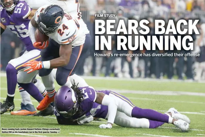  ?? AP ?? Bears running back Jordan Howard flattens Vikings cornerback Holton Hill on his touchdown run in the first quarter Sunday.