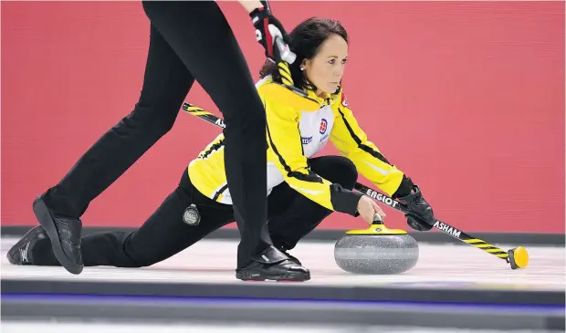  ?? PHOTOS: SEAN KILPATRICK / THE CANADIAN PRESS ?? Manitoba skip Michelle Englot delivers a stone while taking on British Columbia at the Scotties Tournament of Hearts on Thursday.