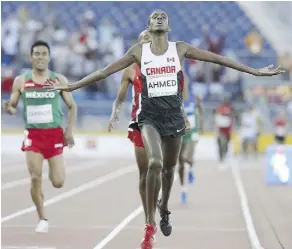  ?? STAN BEHAL/FILES ?? Mohammed Ahmed is targeting a podium finish at the world championsh­ips after placing fourth in the Olympics.