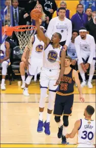  ?? RONALD MARTINEZ / AGENCE FRANCE-PRESSE ?? Kevin Durant of the Golden State Warriors dunks against the Cleveland Cavaliers in Game 1 of the 2017 NBA Finals at Oracle Arena on Thursday.