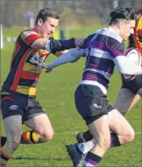  ?? FM4680269 ?? Ashford captain Rhys Fussell tries to halt Anchorians’ progress