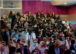  ?? AFP ?? Saudis at the opening ceremony of the film festival at the Saudi Cultural Center in Dammam. —