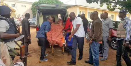  ?? Photo Credit: Premium Times ?? Sen. Dino Melaye arrives in an ambulance for his arraignmen­t at a Lokoja court yesterday