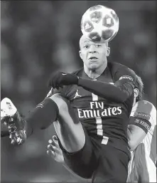  ?? MARKO DJURICA / REUTERS ?? Paris Saint-Germain's Kylian Mbappe in action during Tuesday’s 4-1 victory over Red Star Belgrade in their Champions League Group C match in Belgrade, Serbia.