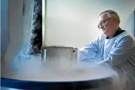  ??  ?? The various tissues are held in freezers that range in temperatur­e from a standard minus 35 degrees Celsius to a liquid nitrogen-induced -180C. Here, tissue co-ordinator Vladimir Slyshkov handles tissues kept at -180C at the Epsom centre.