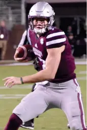  ?? (Photo by Jason Cleveland, SDN) ?? Mississipp­i State quarterbac­k Nick Fitzgerald runs with the football against Arkansas last season.