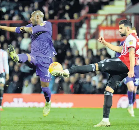  ??  ?? IN WHERE IT HURTS: Stoke City striker Benik Afobe blocks a Brentford clearance on Saturday. Pictures: Peter Stonier