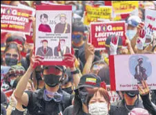  ?? REUTERS ?? Protesters flash a three-finger salute during a march to protest against Myanmar’s military coup, in Taipei, Taiwan.