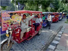  ?? — PTI ?? E-rickshaw drivers protest against government policies near the Delhi Secretaria­t on Monday.