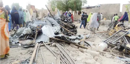  ?? PHOTO: ?? Panick set in after two bombs exploded, killing scores of people in Maiduguri, Borno State on March 4. Photo: File