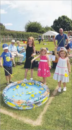  ?? FM4813561 ?? Catching ducks at the Lady Joanna Thornhill Primary School fete