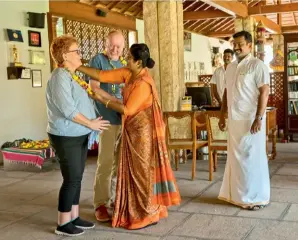  ??  ?? Guests being welcomed at the property.