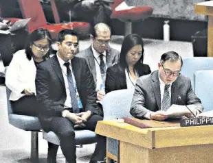  ??  ?? FOREIGN Affairs Secretary Teodoro L. Locsin Jr. (right) called for better risk assessment and mitigation strategies on climate-related disasters at the UN Security Council Open Debate.