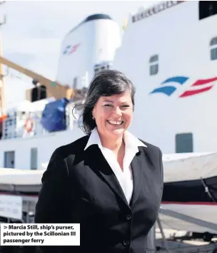  ??  ?? Marcia Still, ship’s purser, pictured by the Scillonian III passenger ferry