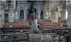  ??  ?? Mart Shmony Syriac Orthodox church in Bartella which was taken from Isil yesterday