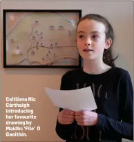  ??  ?? Caitlíona Nic Cárthaigh introducin­g her favourite drawing by Maidhc ‘File’ Ó Gaoithín.