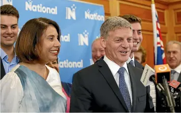  ?? STUFFPHOTO: MONIQUE FORD/ ?? Bill English resigns as National Party leader, quits politics. His wife Mary and two of his sons stand by his side.