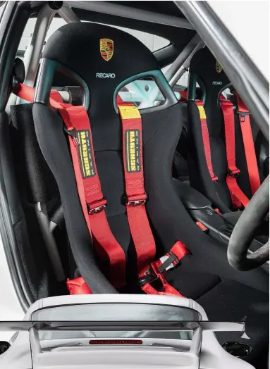  ??  ?? RIGHT cloth recaro seats offer superb hold with choice of schroth harnesses or Porsche lap belts; carbon wing was adjustable