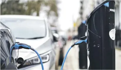  ?? Photo: PA/John Walton ?? An electric car charging