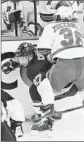  ?? Gene J. Puskar Associated Press ?? MATS ZUCCARELLO checks Pittsburgh’s Sidney Crosby into the boards in the first period.