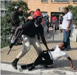  ?? PICTURE: MOTSHWARI MOFOKENG ?? NABBED: Security arrest students during a protest at the UKZN Westville campus last month. The univesity is affected by violent protests .