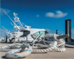  ??  ?? It’s good manners to keep the dock around your boat tidy, with the lines and hose coiled and your shorepower cord shipshape so it won’t trip anyone at night. If your neighbors leave a hose or shorepower cord in a mess, coil it for them and hopefully they’ll get the hint.