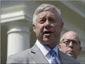  ?? SUSAN WALSH — THE ASSOCIATED PRESS ?? Rep. Fred Upton, left, who voted to impeach President Donald Trump over the Capitol insurrecti­on, announced Tuesday that he's retiring after 35 years in office.