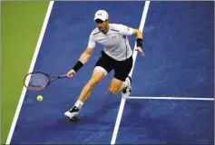  ?? ANDRES KUDACKI/ THE ASSOCIATED PRESS ?? Andy Murray returns a shot during his 6-4, 6-1, 6-4 victory over Marcel Granollers in the second round of the U.S. Open on Thursday in New York.