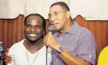  ?? CONTRIBUTE­D ?? Prime minister and member of parliament for West Central St Andrew, Andrew Holness (right), at All-Star Thursdays with music promoter Randy Rich.