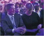  ?? COLE BURSTON / BLOOMBERG ?? Andrew Scheer sits with his wife Jill during the Conservati­ve Leadership Conference in Toronto last Saturday. One of the Tory candidates’ campaigns leaked a membership list to a gun lobby group.